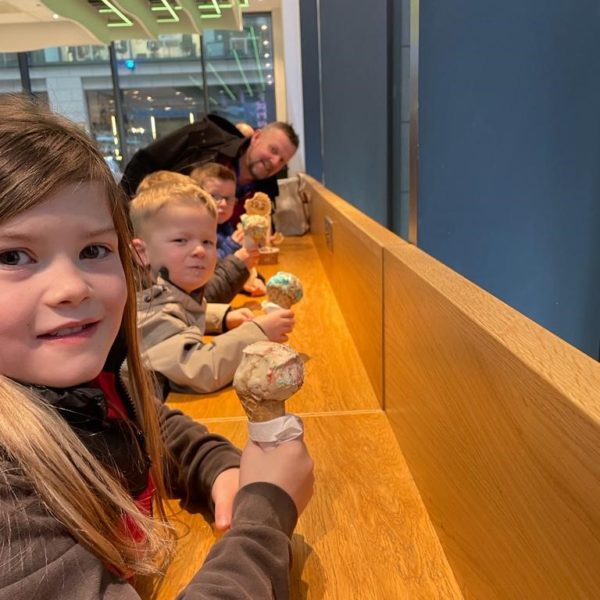 Michael Ogg and his grandchildren enjoying an ice cream at Mackie's 19.2 after the Panto